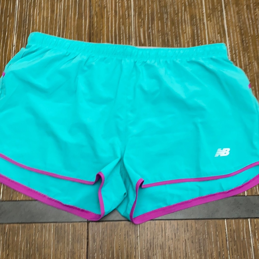 New Balance teal shorts